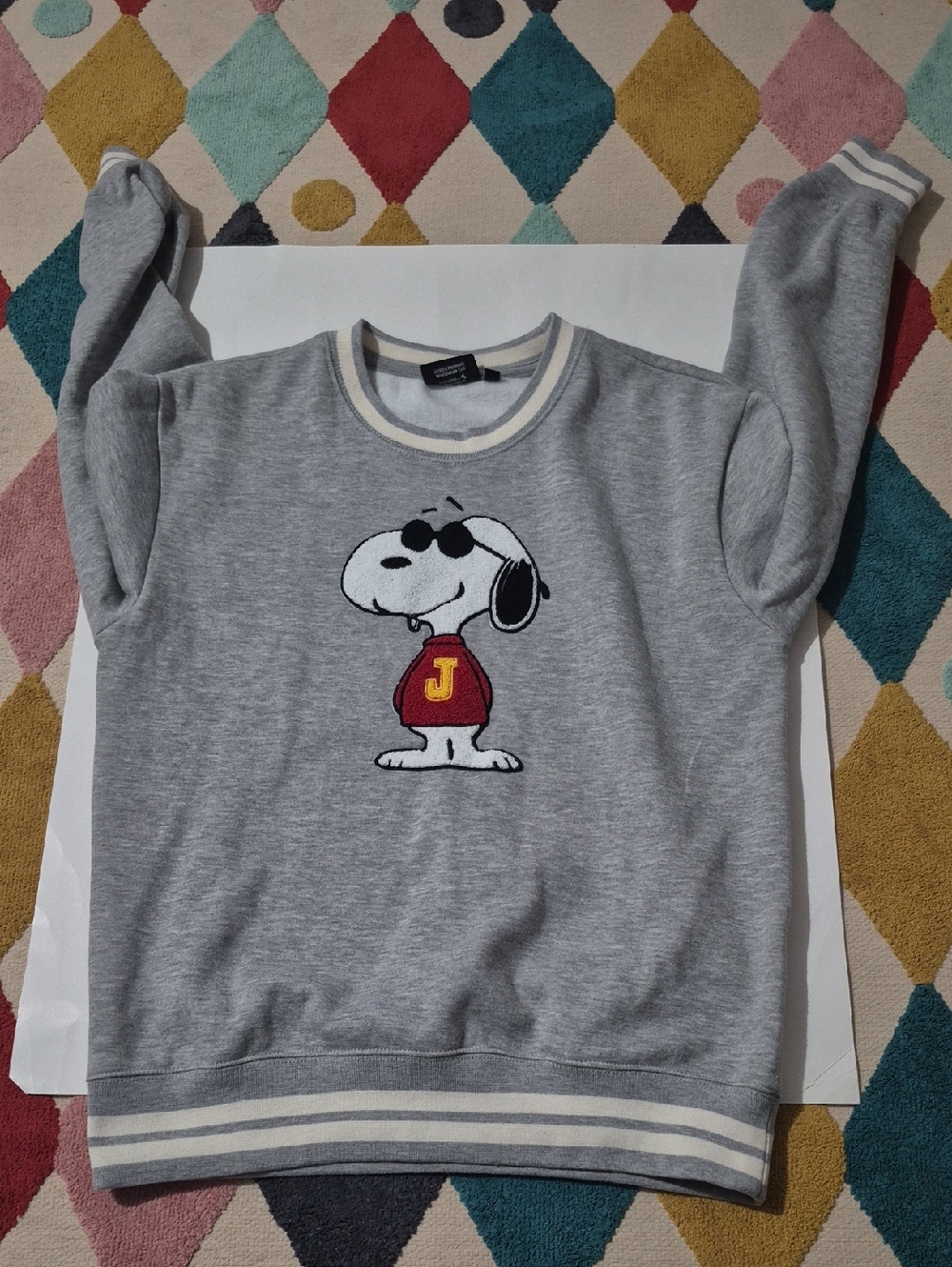 Peanuts "Joe Cool" Snoopy Graphic Crewneck Fleece Sweatshirt.
